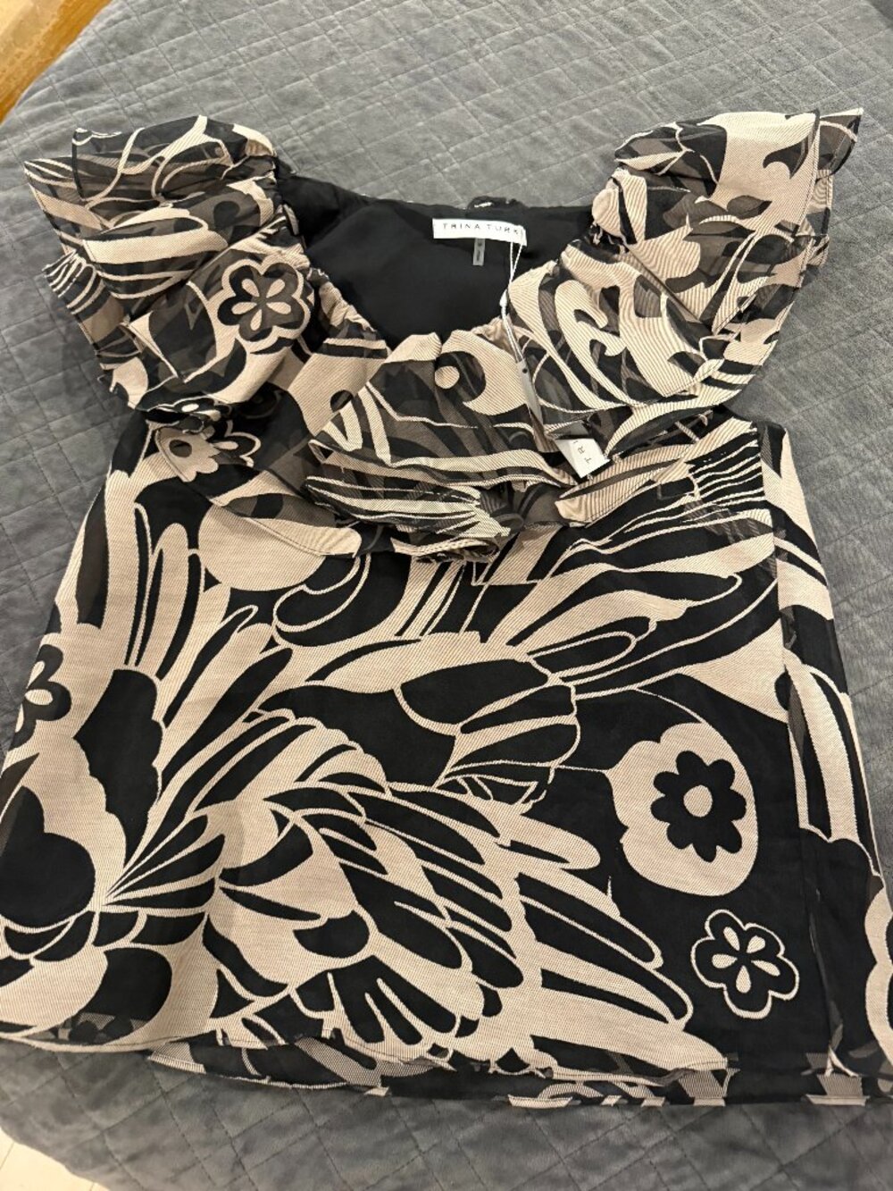 Trina Turk black and tan blouse with tags on